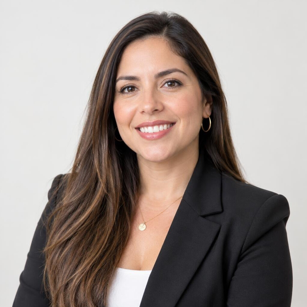 Portrait of a smiling Latina woman with long brown hair